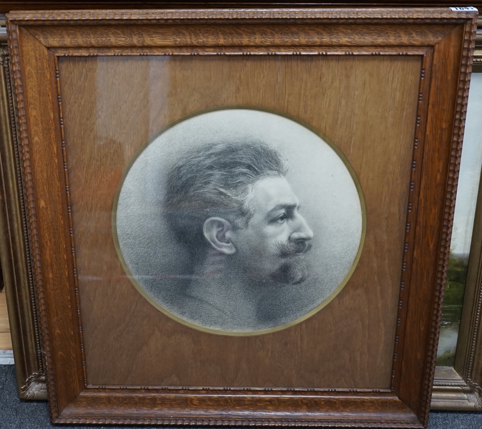 Early 20th century, charcoal, Portrait of Godefroid DeVreese (Belgian, 1861-1941), tondo, indistinctly signed and dated 1916, H. De Lau, Icelles label verso, 35cm diameter. Condition - fair, a few minor spots of foxing